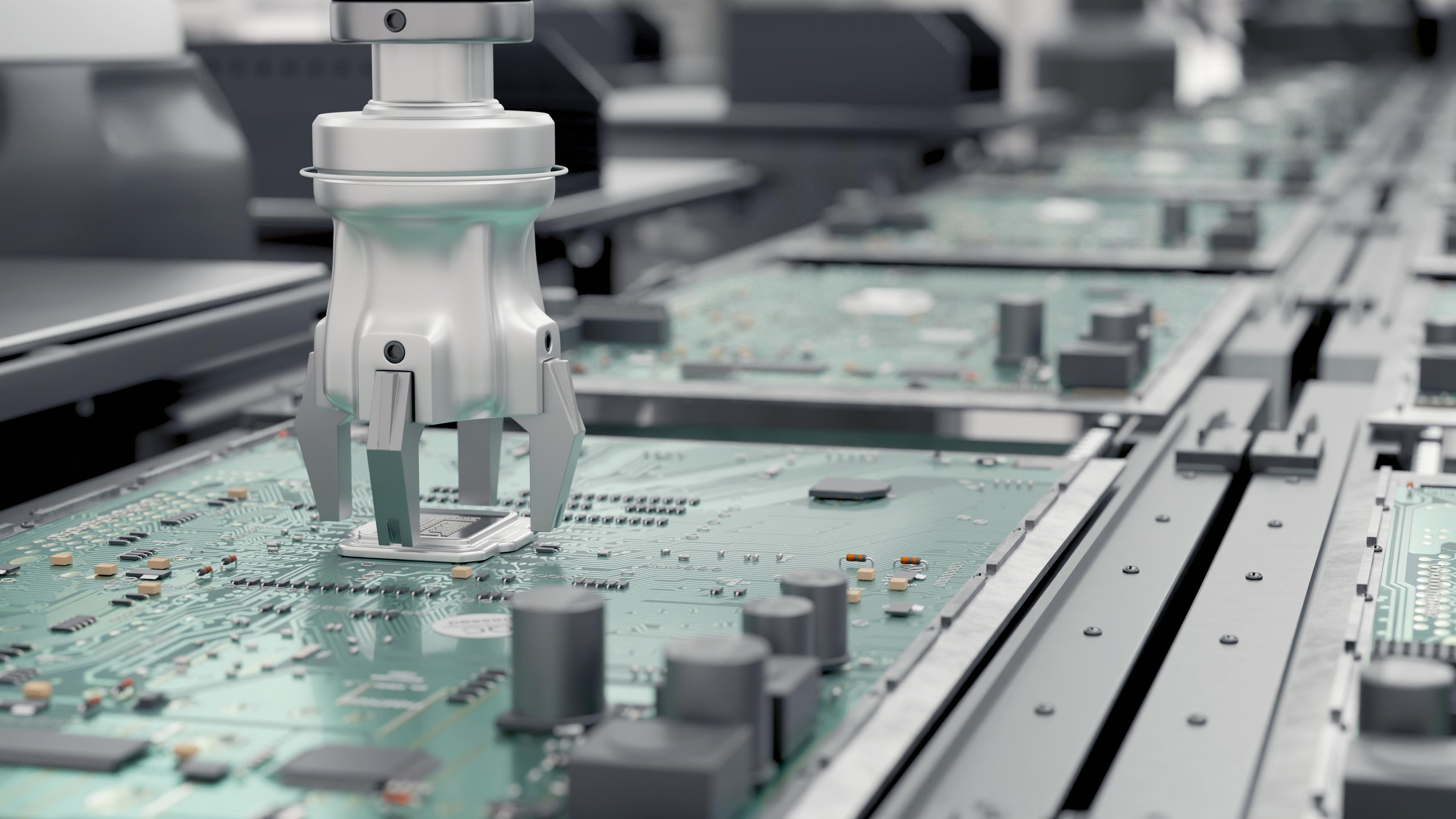 Robotic arms automate circuit board assembly