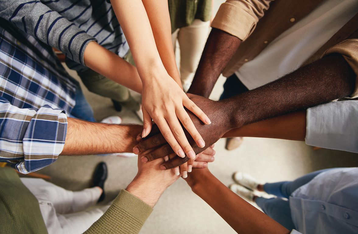 Image of hands to represent a diverse and inclusive workforce and culture.