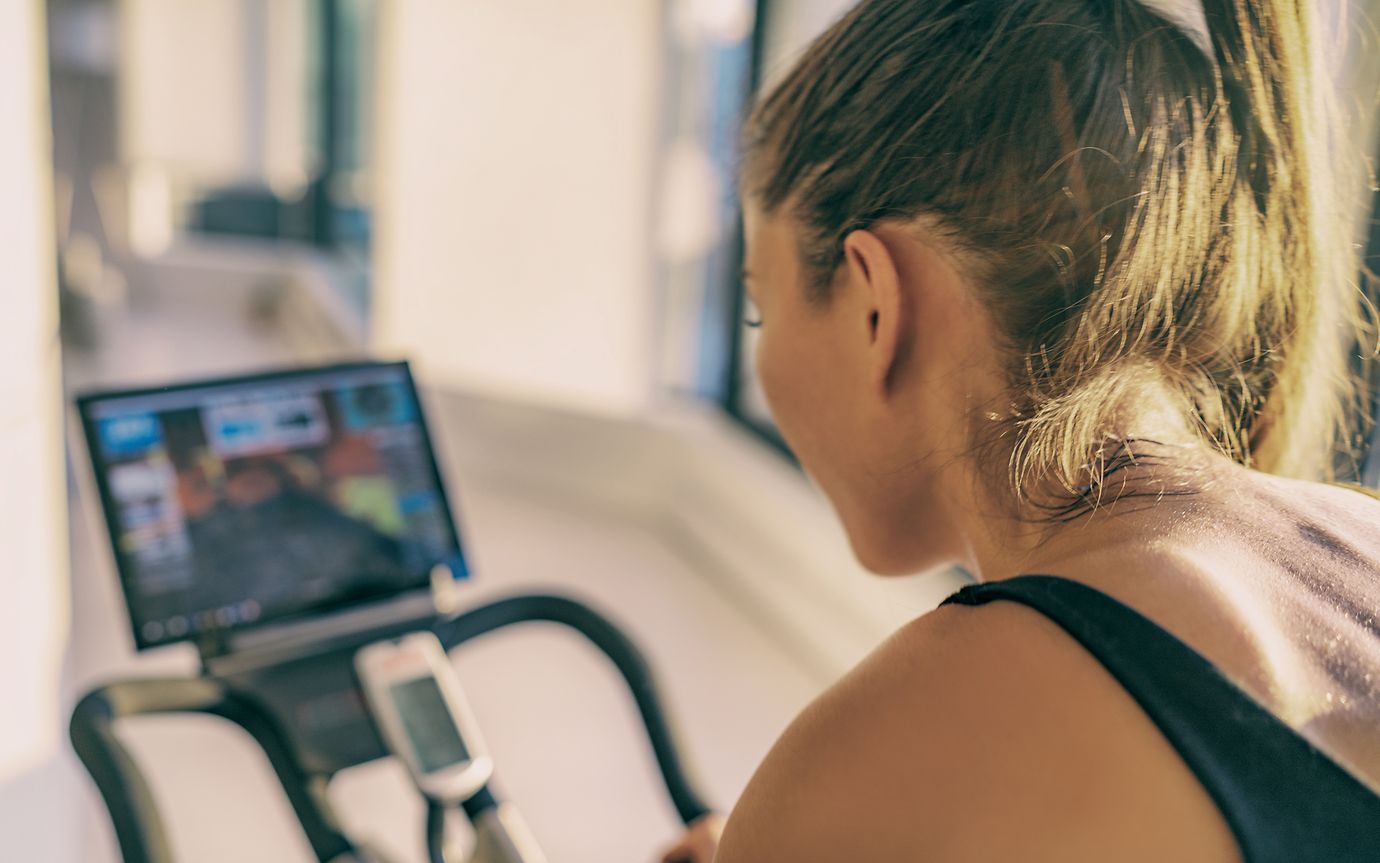 woman on exercise bike