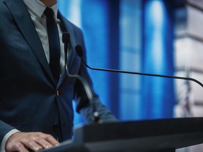 speaker at podium