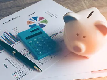 calculator and piggy bank