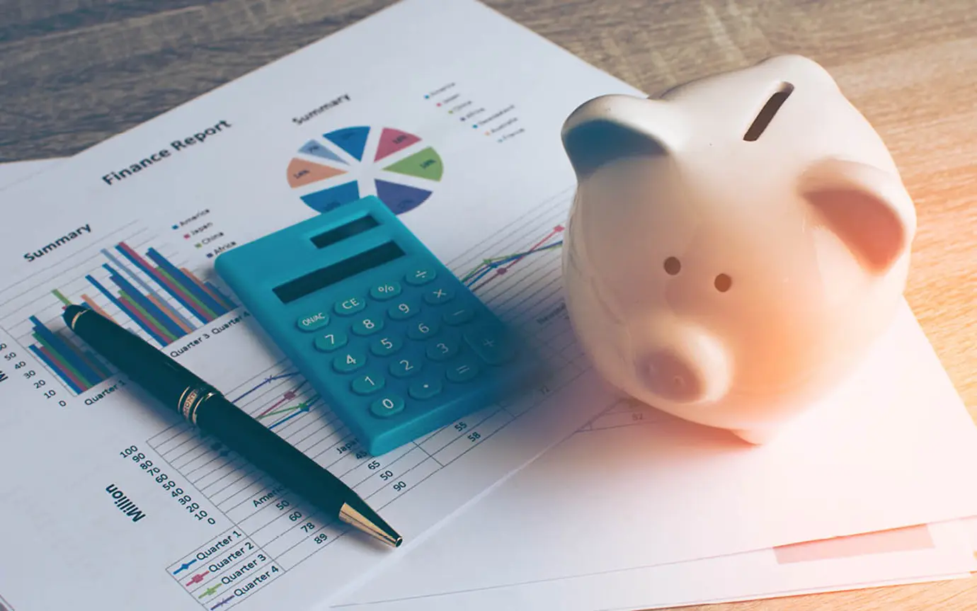 calculator and piggy bank