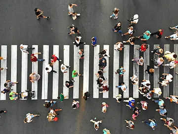 people crossing at a busy crossing