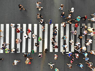 people crossing at a busy crossing