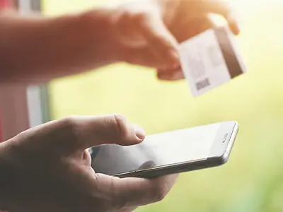 person making online payment using their phone 