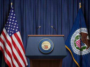 american and federal reserve flags by lecturn
