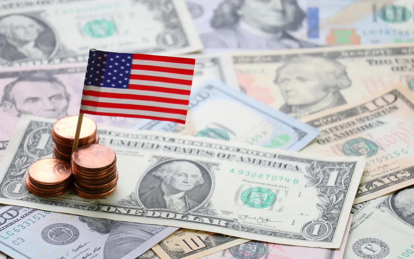 US flag sign and Dollar cash banknote and coin background