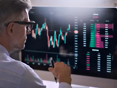 Crypto trader investor analyst broker using pc computer analyzing online cryptocurrency exchange stock market indexes charts investing money profit in trading platform stockmarket. Over shoulder view.
