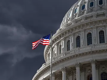 Dark sky over the US Capitol Building dome in Washington
