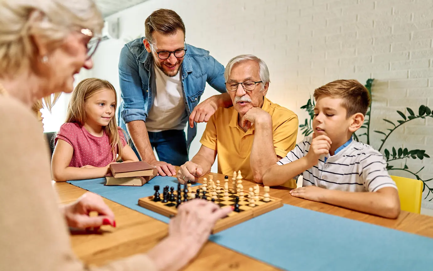 Family playing chess